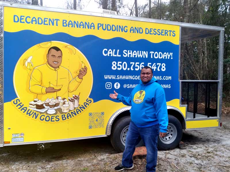 Shawn Standing in front of the Shawn Goes Bananas Desert Trailer. 