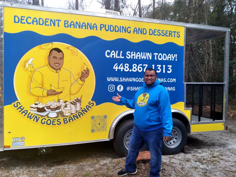 Shawn Standing in front of the Shawn Goes Bananas Desert Trailer.